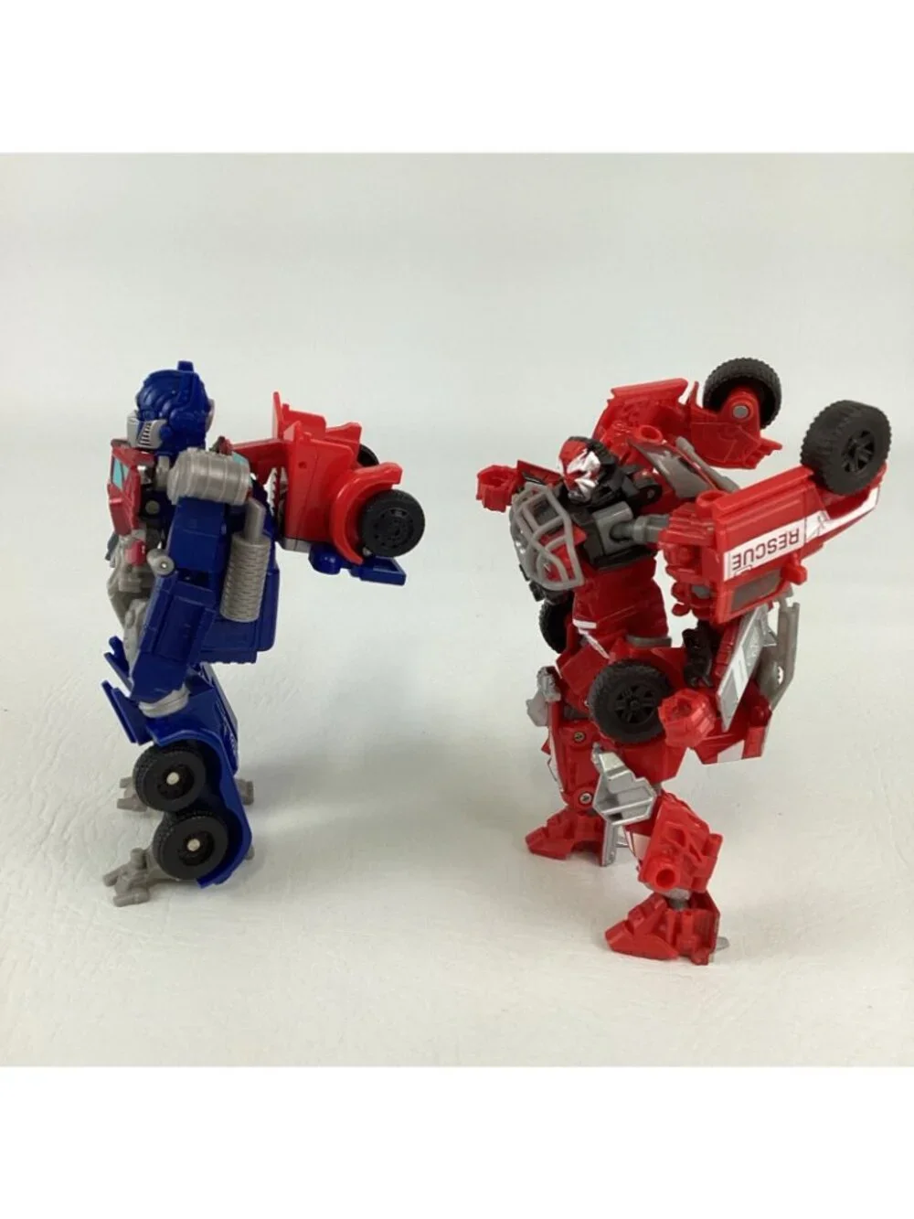 Transformers Dark Of The Moon Action Figures Ratchet Optimus Prime Autobot Toy